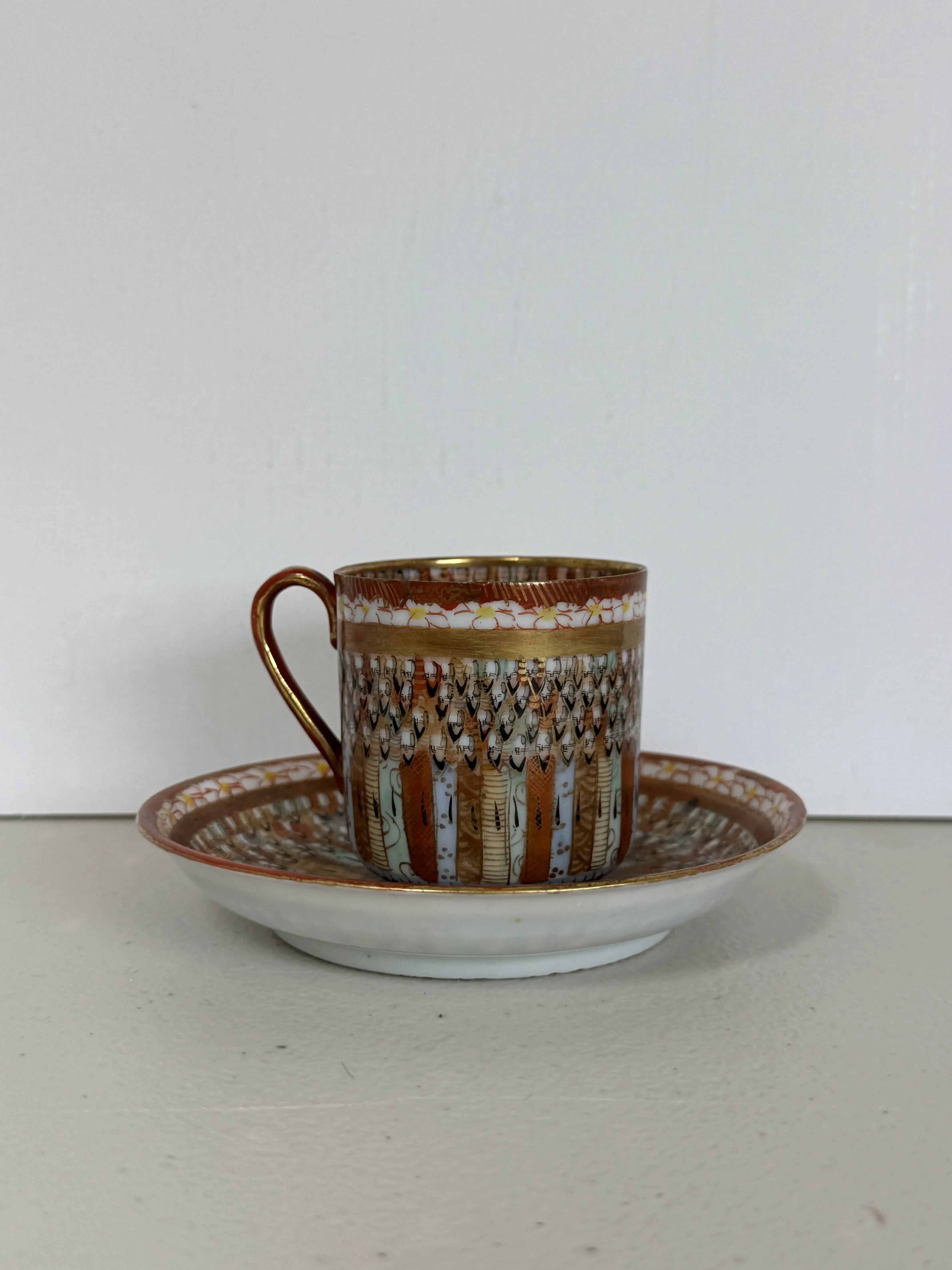 Japanese Kutani Porcelain Cup and Saucer