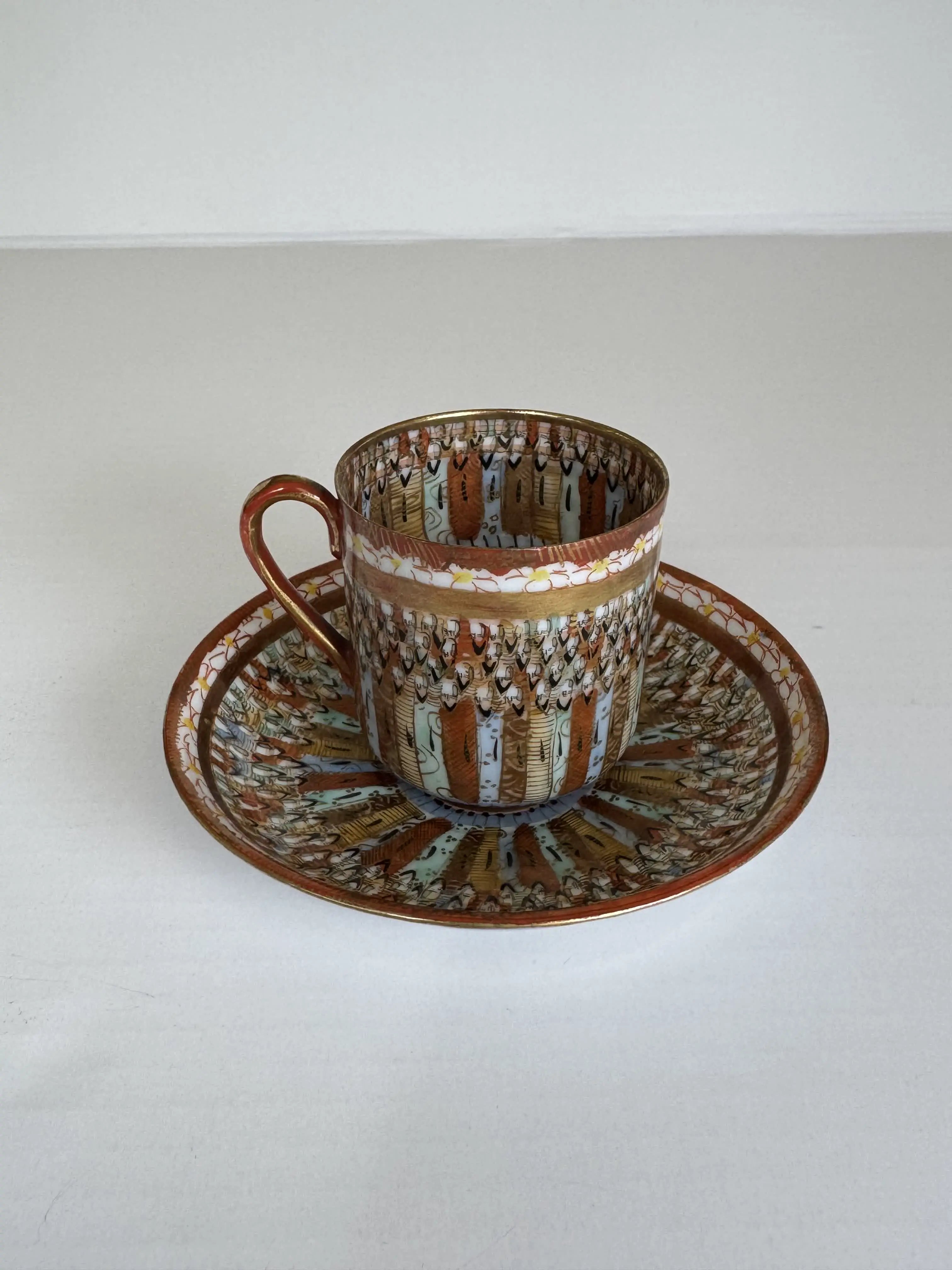 Japanese Kutani Porcelain Cup and Saucer